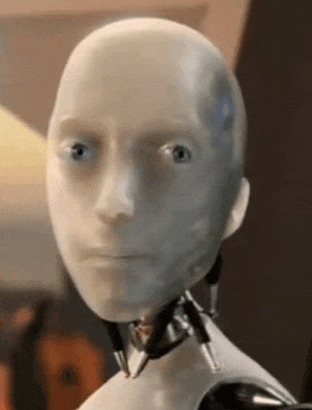 a close up of a robot 's face with a serious expression .