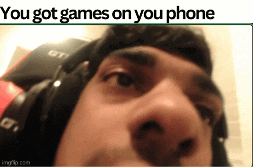 a close up of a man 's face with the words " you got games on your phone "