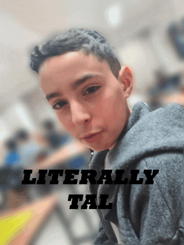 a picture of a young boy with the words literally tal on the bottom