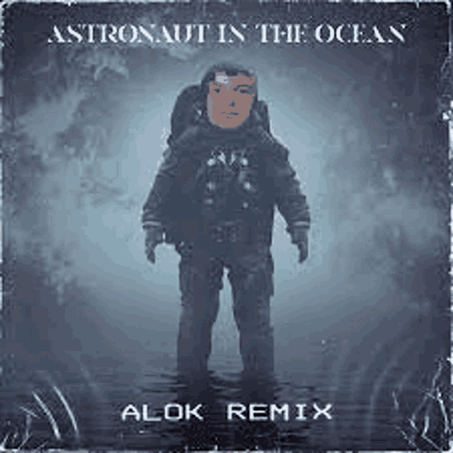 a man in a space suit is standing in the ocean on the cover of a album .