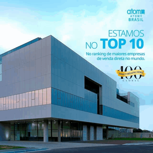 an ad for atomy brasil shows a large building with lots of windows