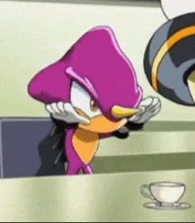 a purple and orange cartoon character is sitting at a table with a cup of coffee .