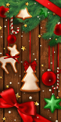 christmas decorations hanging on a wooden wall including a gingerbread tree