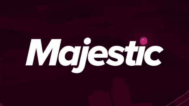 a logo for majestic shows a city in the background