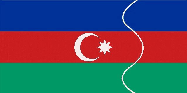 a red green and blue flag with a white star and crescent moon