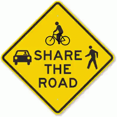 a sign that says share the road with a car and a pedestrian