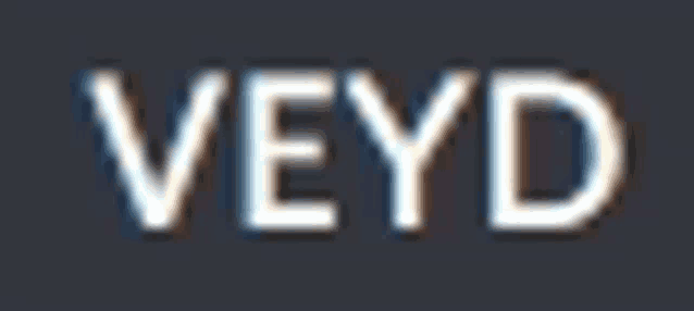 a blurred image of the word veyd on a dark background .