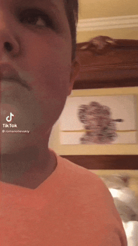 a man 's face is shown with a tik tok watermark