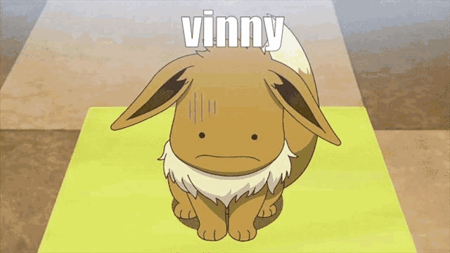 a cartoon eevee is sitting on a yellow mat with the word vinny above it