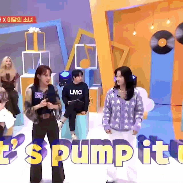 a group of people standing in front of the words pump it