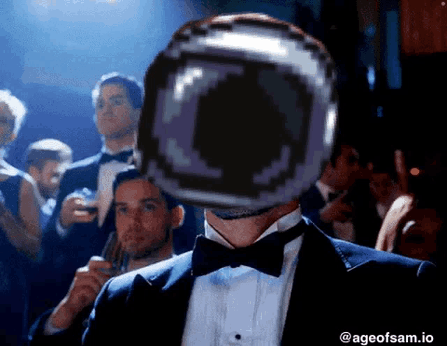 a man wearing a tuxedo and bow tie has a pixelated head