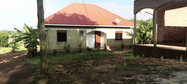 a house with a satellite dish on the roof