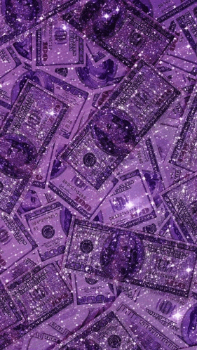 a bunch of purple money with sparkles on it