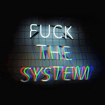 a neon sign that says " fuck the system " on it