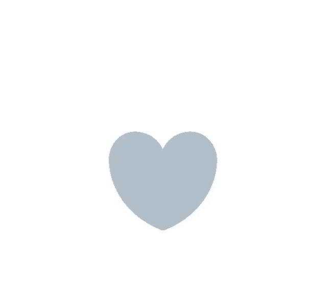 a small gray heart is sitting on a white background .