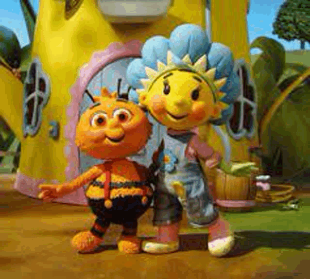 a couple of cartoon characters are standing next to each other in front of a yellow building .