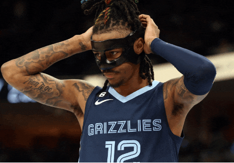 a grizzlies basketball player wears a mask