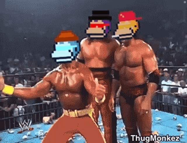 a group of wrestlers are standing in a ring with pixelated faces on their heads