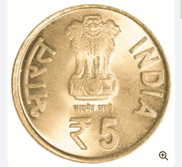 a close up of a gold coin that says india