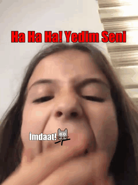 a girl making a face with the words ha ha ha yedim seni