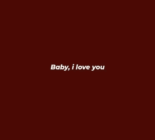 a red background with the words `` baby , i love you '' written in white letters .