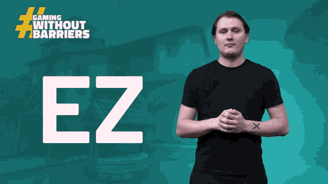 a man stands in front of a green background that says gaming without barriers ez