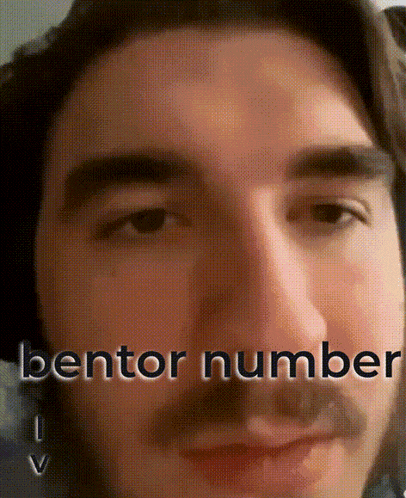 a close up of a man 's face with bentor number written on the bottom