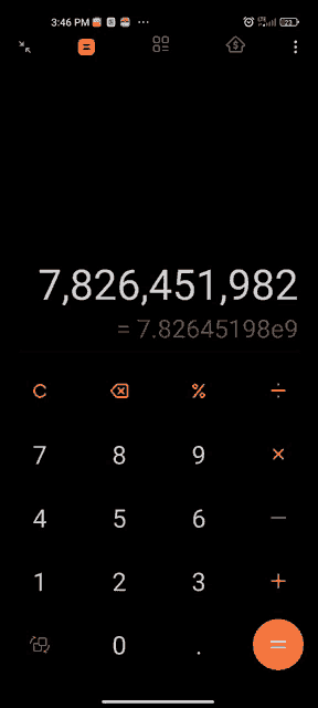 a calculator displays the number 7,826,451,982 on a black background