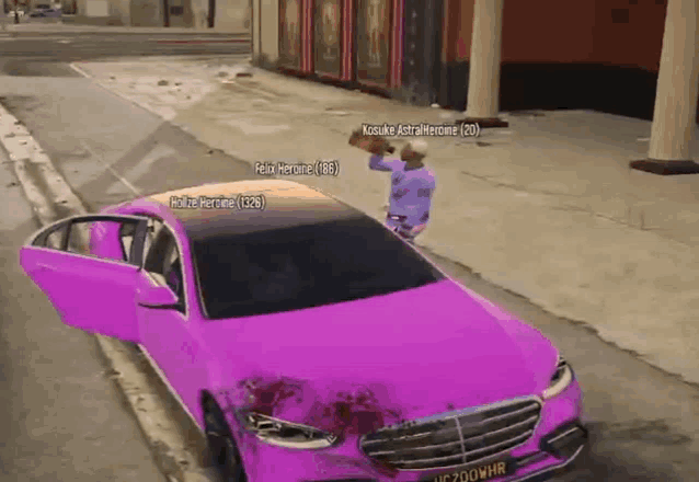 a purple car with a license plate that says uc200hr