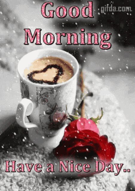 a cup of coffee with a heart drawn on it and a rose next to it says good morning have a nice day