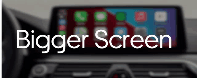 a blurred image of a car dashboard with the words bigger screen written in white