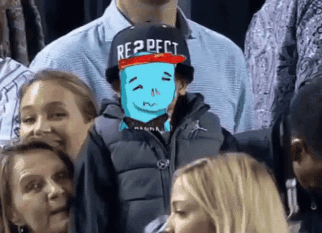 a boy wearing a hat that says respect is surrounded by people