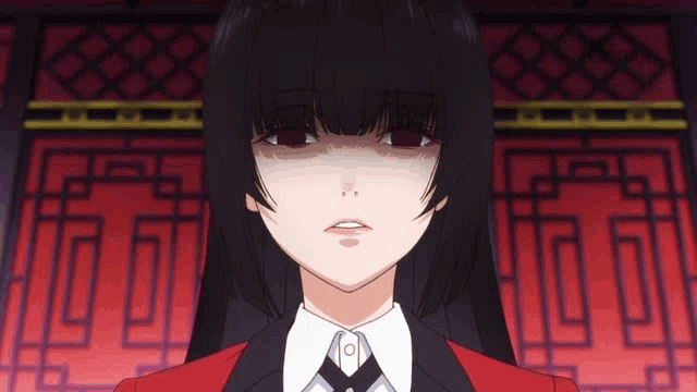 a close up of a girl with red eyes and black hair