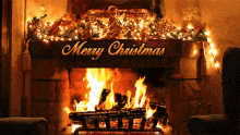 a fireplace with a sign that says merry christmas on it