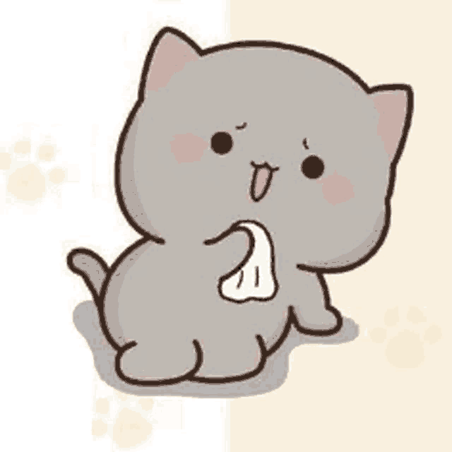 a cartoon cat is sitting on the ground holding a towel in its mouth .