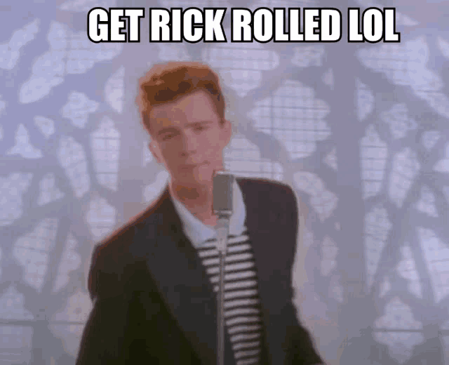 a man singing into a microphone with the words " get rick rolled lol " above him