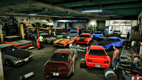 a bunch of cars in a garage with a sign that says street syndicate on it