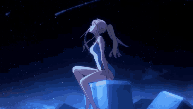 a girl in a bathing suit is sitting on a rock looking at the stars