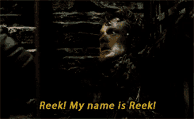 a man in a dark room is saying " reek ! my name is reek "