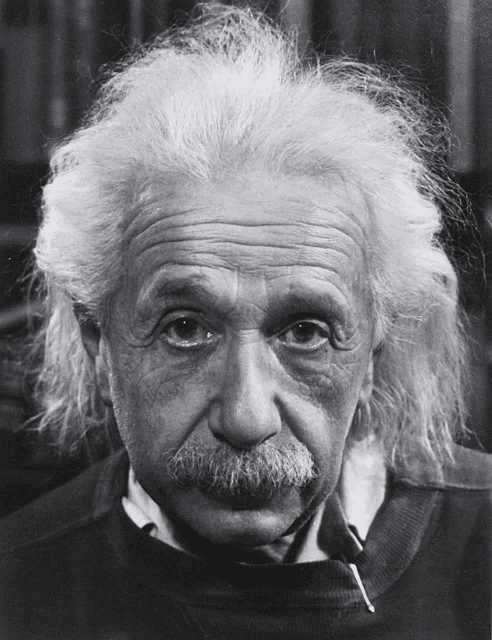 a black and white photo of albert einstein with long white hair and a mustache