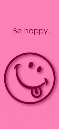 a pink smiley face with its tongue hanging out and the words `` be happy '' .