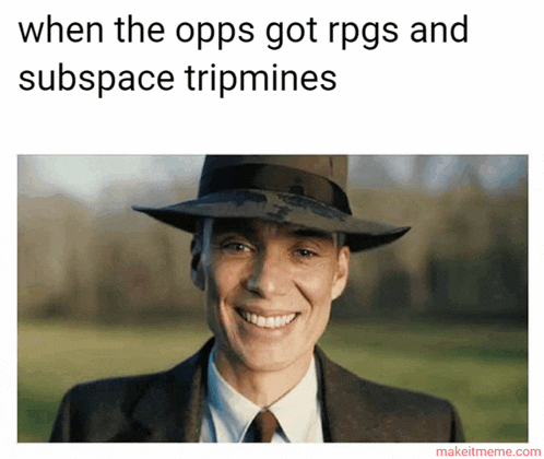 a man in a suit and hat is smiling with a caption that says when the opps got rpgs and subspace tripmines