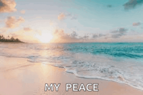 a beach at sunset with the words `` my peace '' written on it .