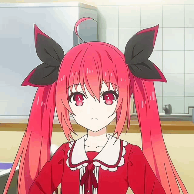 a girl with long red hair has a bow in her hair