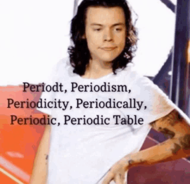 a man with long hair is wearing a white shirt that says periodt periodism periodicity periodically periodic table