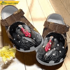 a pair of crocs with a picture of a turkey on them .