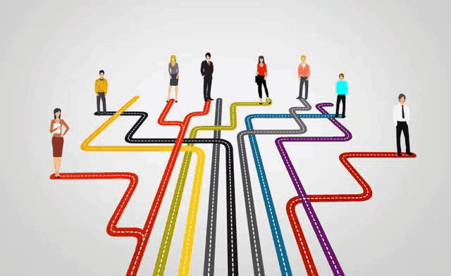 a group of people are standing on a maze of colored roads