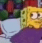 a close up of a cartoon character , spongebob squarepants , laying on a purple blanket .