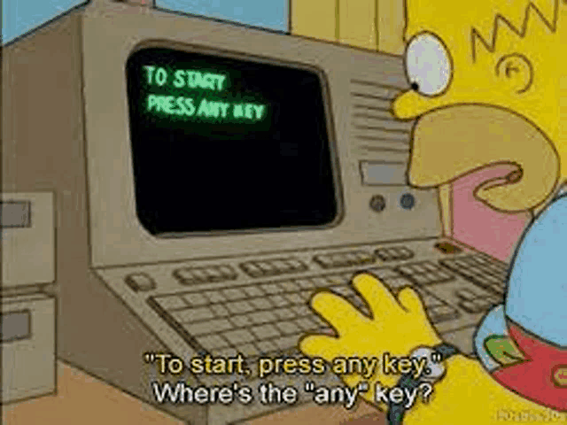 homer simpson is typing on a computer keyboard and asking where is the key .