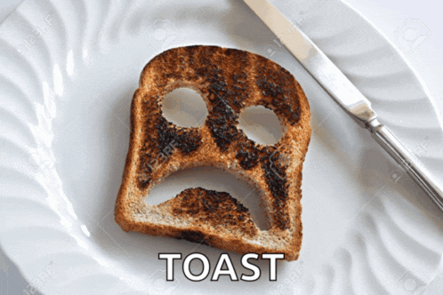 a slice of toast with a sad face drawn on it and the word toast below it